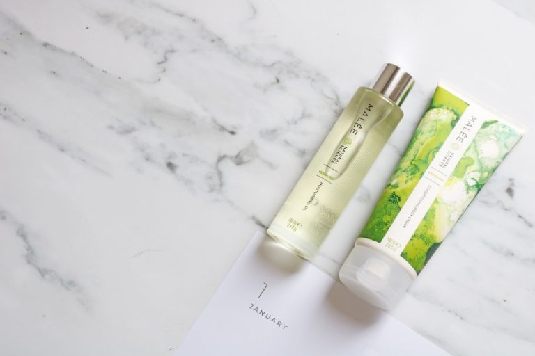 Malée Natural Science New Year Resolutions 100ml Verdure Moisturising Oil 200ml Verdure conditioning Body Cream both bplaced close to a white paper on which a word January is written