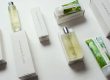 Christmas Gift For Her Malee Natural Science On a white platform Malee 100ml Body oil, Verdure 100ml Room Mist, 75ml Nourishing Hand cream and 200ml Conditioning Body Cream are set up.