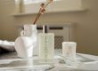 How to self-care at home Malee Natural Science On a marbled table are a bottle of Verdure 100ml room Mist,12ml Verdure Eau de Parfum and 220ml Polyanthes Soy Candle, with a white bouquet de dry flowers