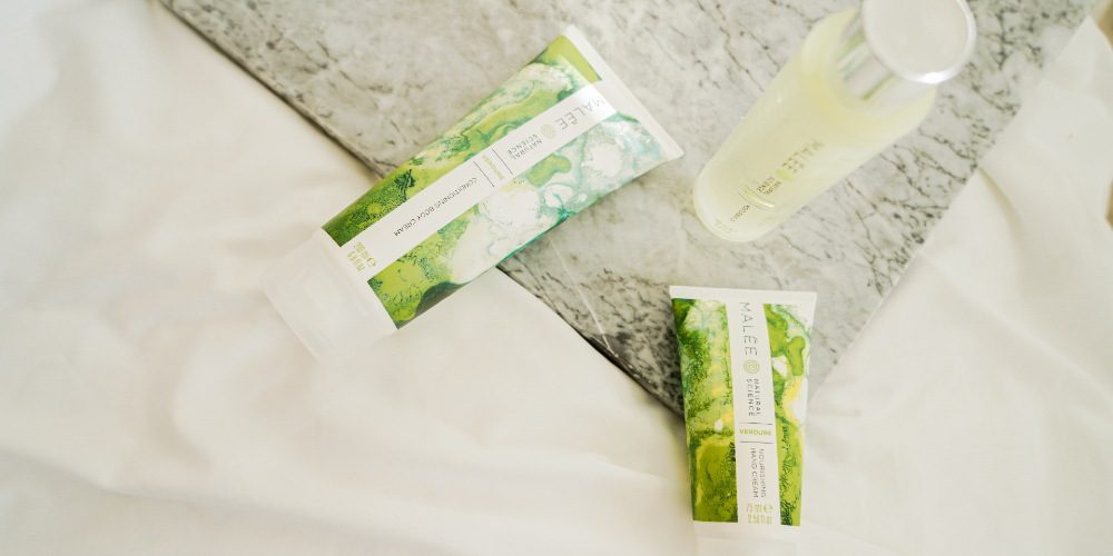 Is-Dry-Skin-Eczema-Malee-Natural-Science Is Dry Skin Eczema Malee Natural Science On the edge of a marbled table, 100ml Verdure body oil, 200ml Verdure Conditioning Body Cream and 75ml Nourishing Hand Cream