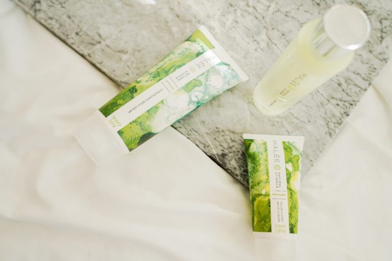 Is Dry Skin Eczema Malee Natural Science On the edge of a marbled table, 100ml Verdure body oil, 200ml Verdure Conditioning Body Cream and 75ml Nourishing Hand Cream