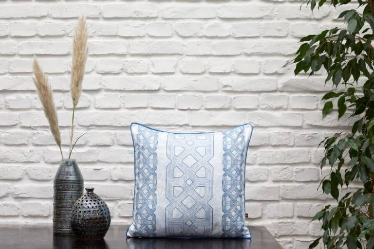 Malée Natural Science Interior design Eva Sonaike Ala indigo cushion on console table with vases and green plant