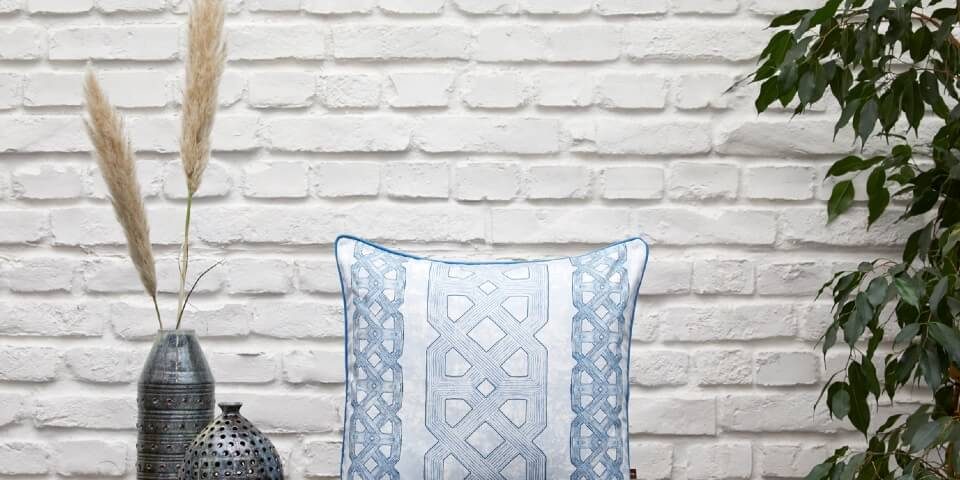 Ala Indigo Cushion MLR-2-2 Malée Natural Science Interior design Eva Sonaike Ala indigo cushion on console table with vases and green plant