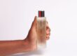 Natural skincare dry skin Malee Natural Science a female hand holding firmly the 100ml Verdure Moisturising Oil
