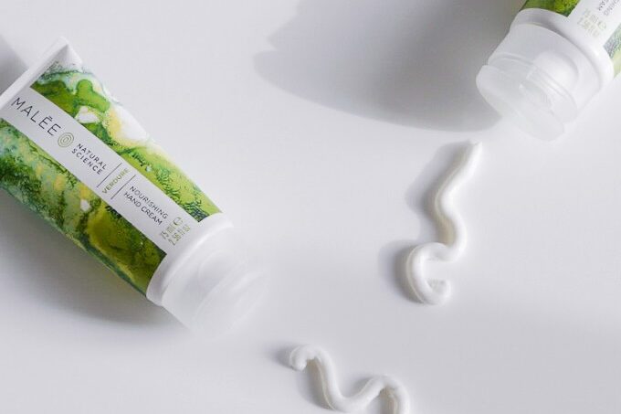 Best Hand Cream For Very Dry Skin Malee Natural Science On a pale grey background 2 x 75ml Verdure Nourishing Cream laid side by side a snake line has been drawn with cream in front of each tube.