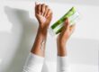 Feelin Fantastic Malee Natural Science, Female arms wearing a white long sleeves trying the 200ml Verdure Conditioning Body cream on the left arm